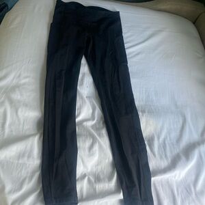 Lululemon Black leggings with pockets and zipper near butt